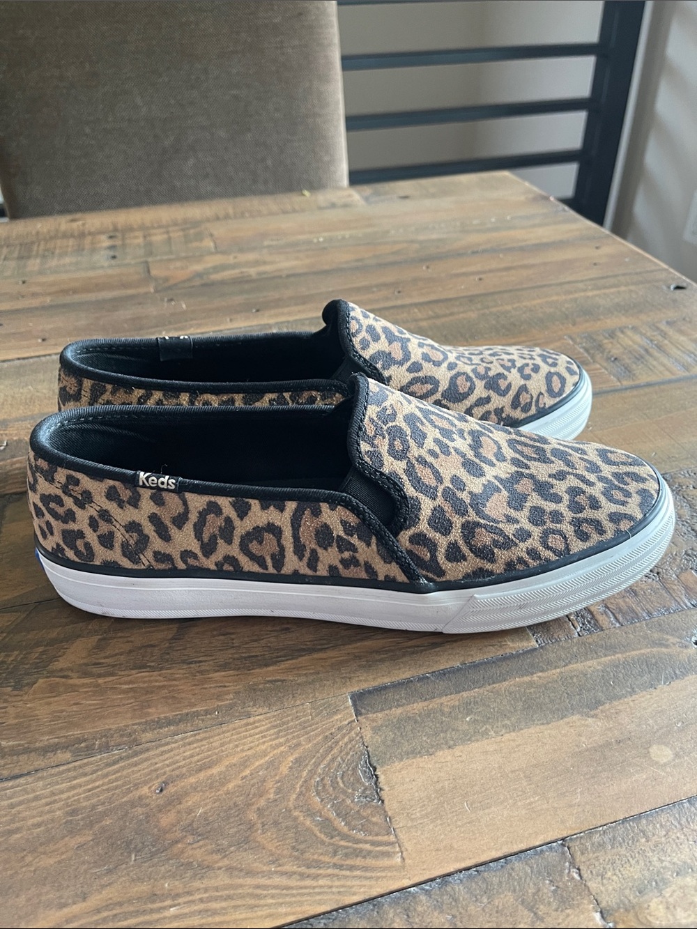 Keds Leopard Print Slip-On Sneakers in Brown and Black